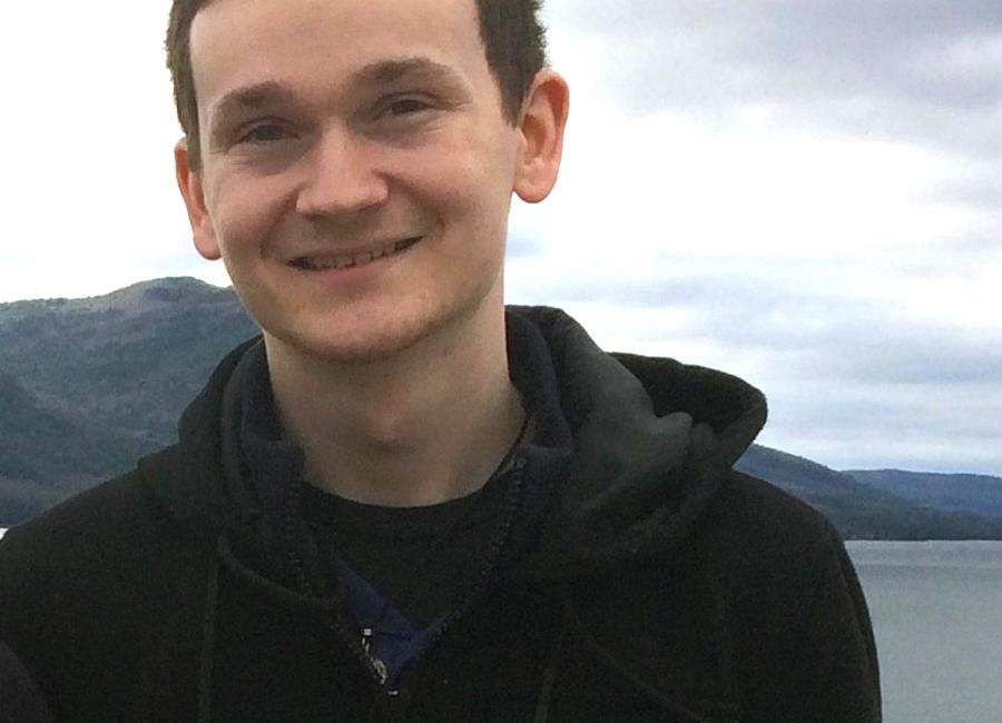 Photo of Dallas Fonseca standing in front of body of water