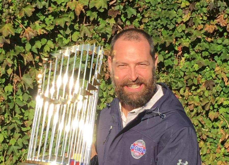Josh Lifrak poses with World Series Commissioner's Trophy