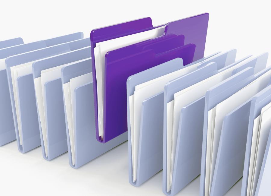 folders lined up with a purple folder slightly above the rest