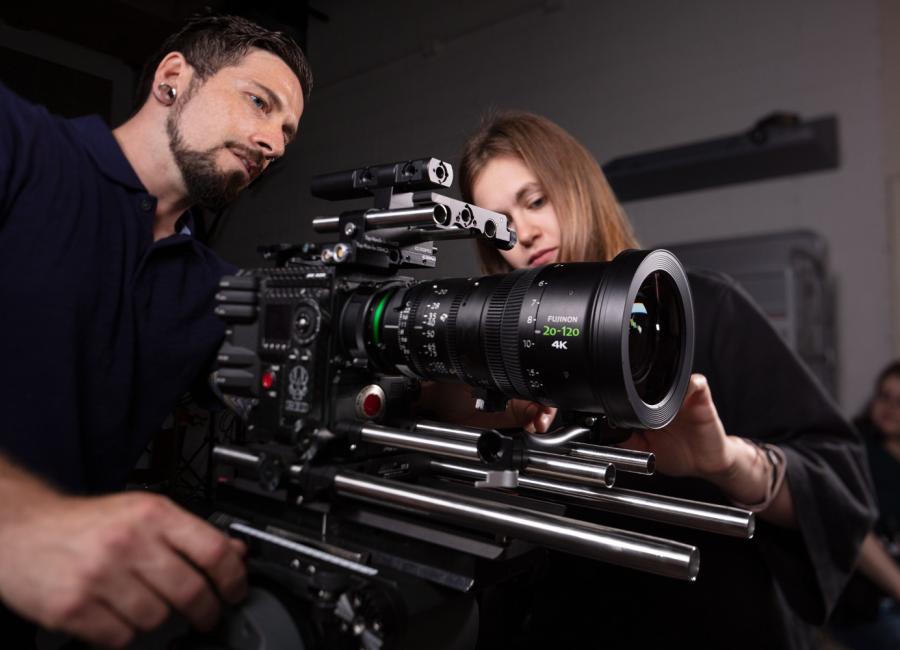 Students assemble and work with the RED camera system.