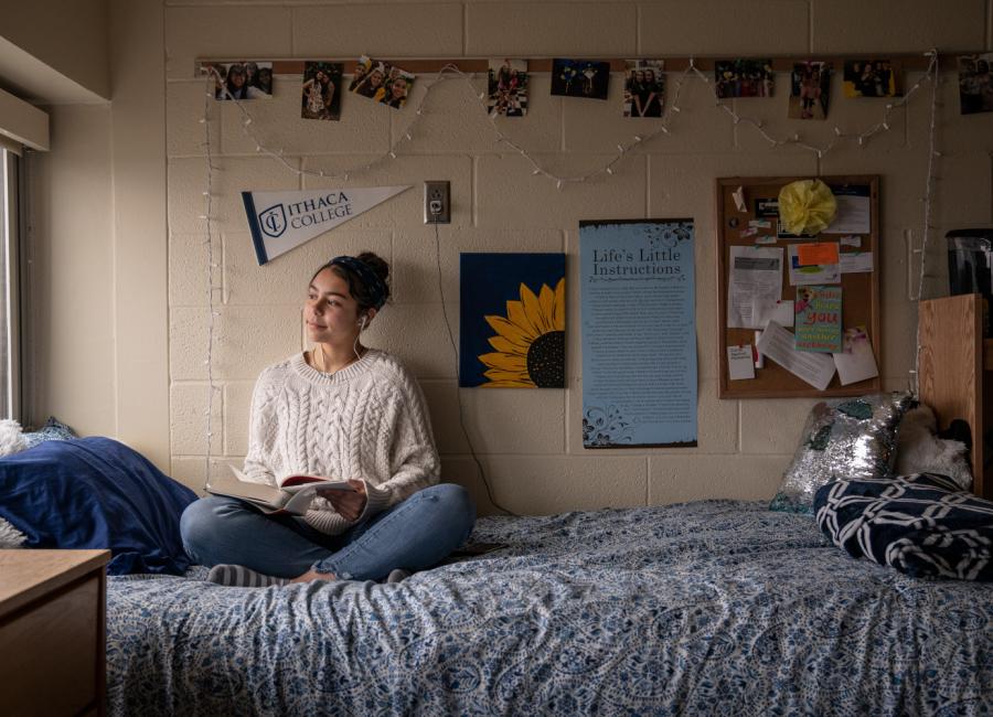 Woman relaxing on her bed