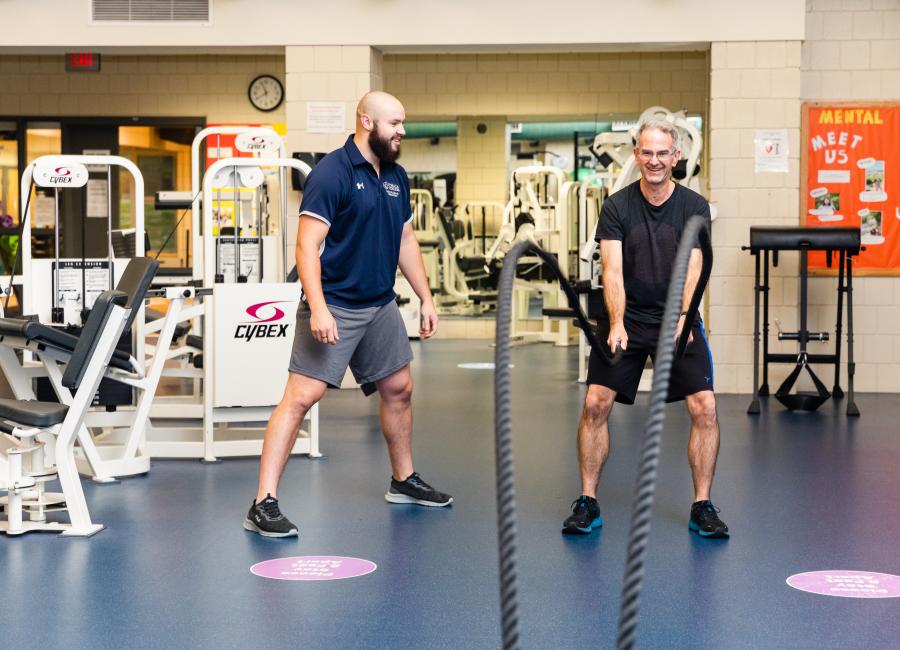 Member working with a fitness specialist (2023) 