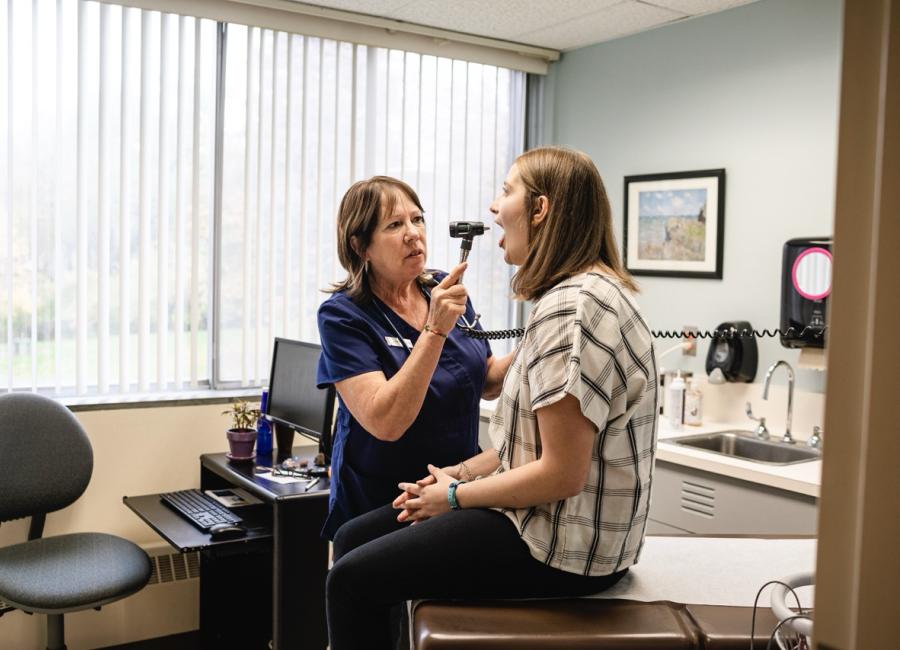 Student receiving a medical checkup at Ithaca College's Student Health Services in Hammond Health Center