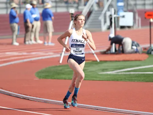 A female athlete running on a track