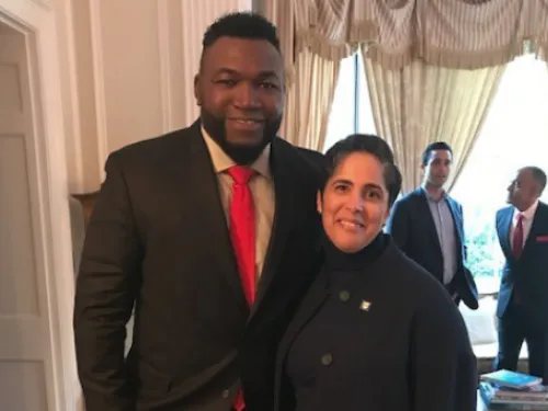 Shirley M. Collado and David Ortiz pose for a photo