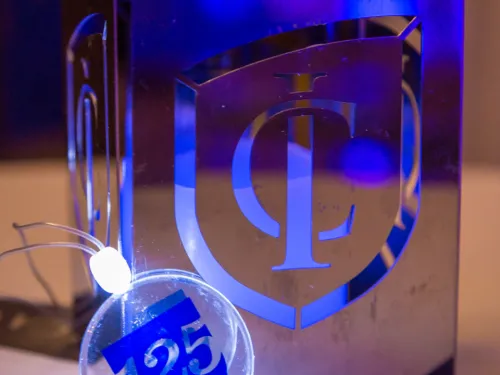 Lantern and necklace with IC 125 logo