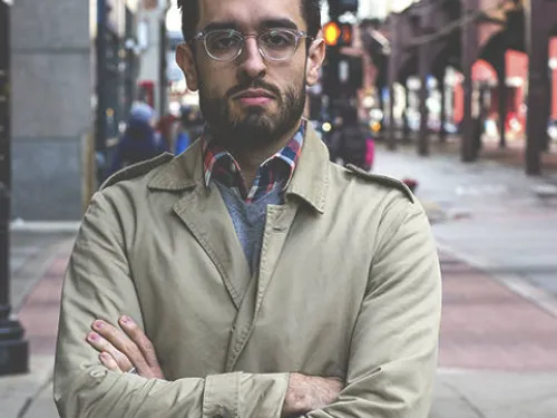 man with arms folded