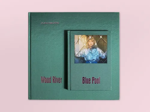 One large and one small teal book