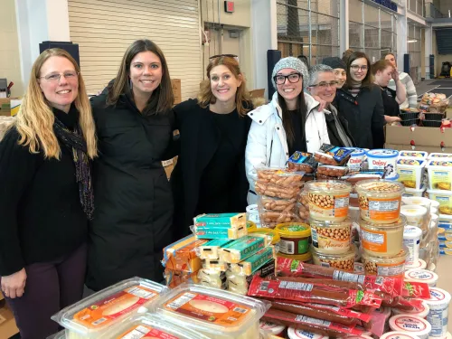 IC staff members volunteer at the mobile food pantry