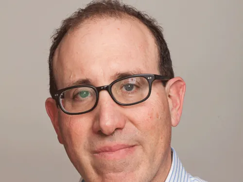 Headshot of Joel Simon.