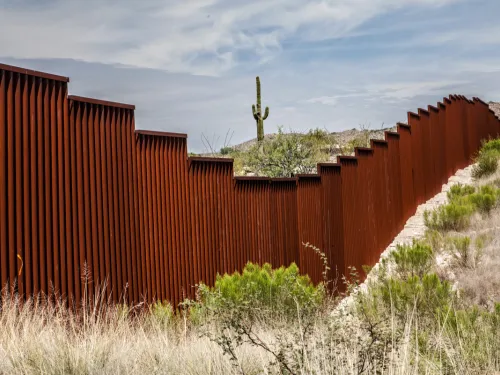 A rusty metal wall in the desert