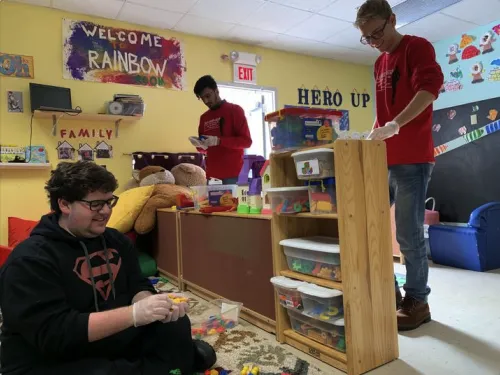 Students cleaning at the Downtown Ithaca Children's Center