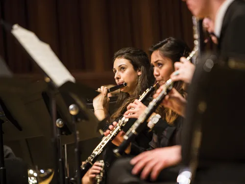 Students performing wind instruments