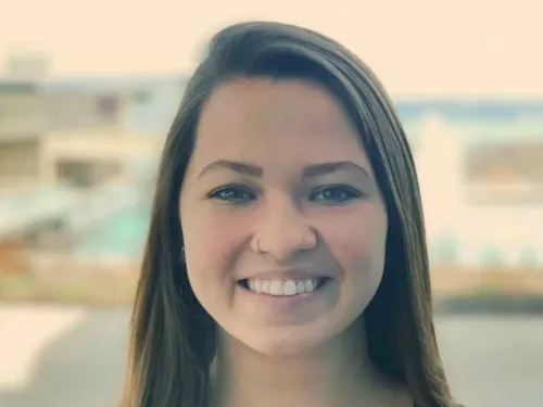 A young woman smiling