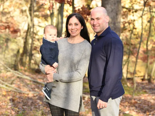 Parents with a child in the woods