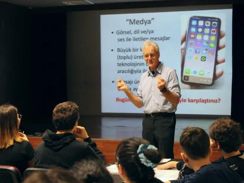 A man speaking to an audience 