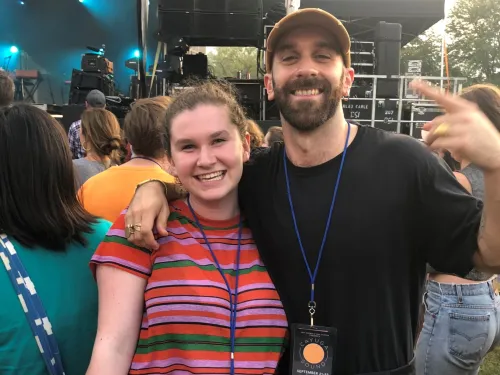 student working at concert