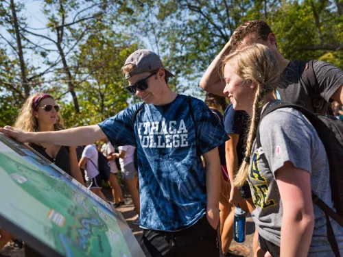 Students Looking at Sign