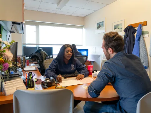 Student working with an advisor