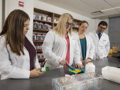 pharmacy professor and students
