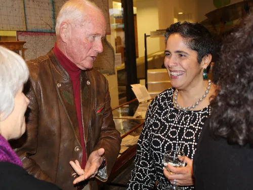 President Shirley M. Collado talks with local leaders