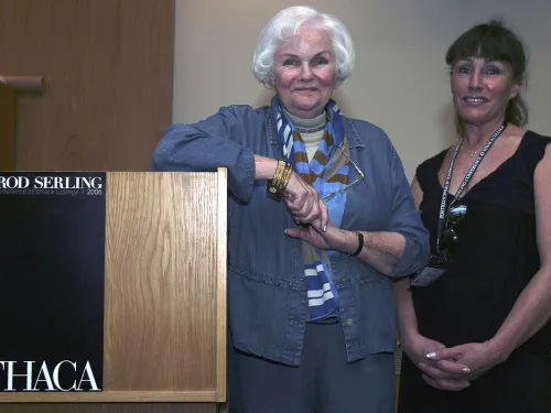two women by a lectern