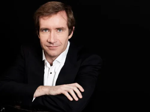 man with arms folded