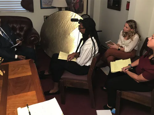 Alumni conducting an interview