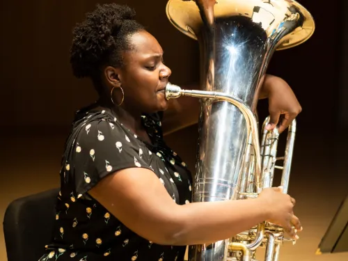 Student playing tuba