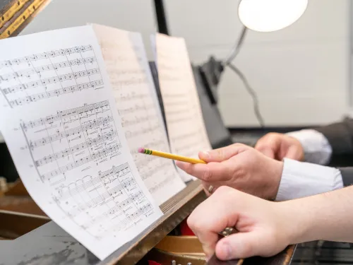 Student composing sheet music