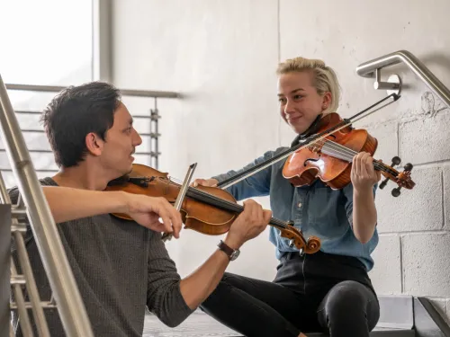 String players in a stairwell