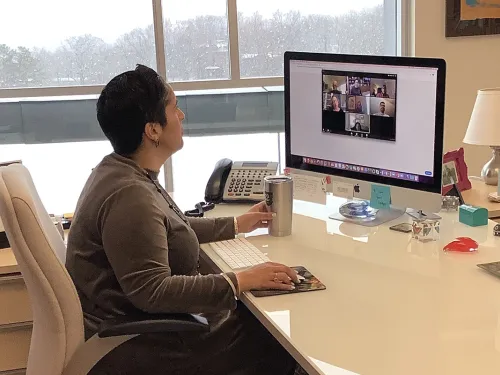 President Shirley M. Collado at her desk