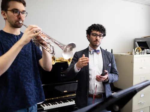 Professor Coletti working with a student