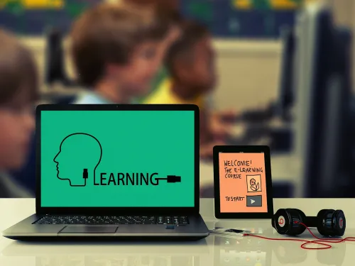 laptop with e-learning website showing