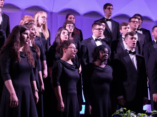 Students singing in a choir