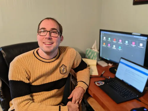 Ian Moore looking at screen