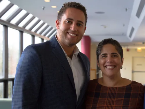 Ithaca Mayor Svante Myrick stands with Ithaca College President Shirley Collado