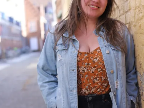 Headshot of young woman with long brown hair