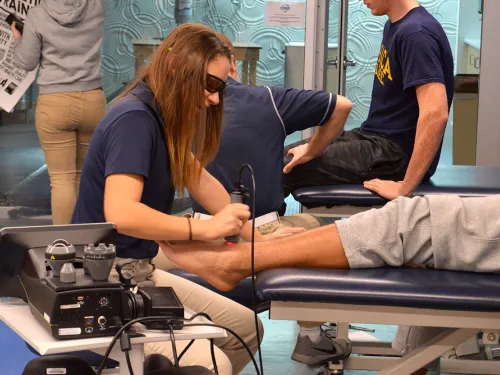Athletic training student working in clinic
