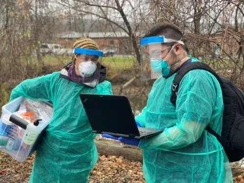 Young woman community outreach regarding COVID