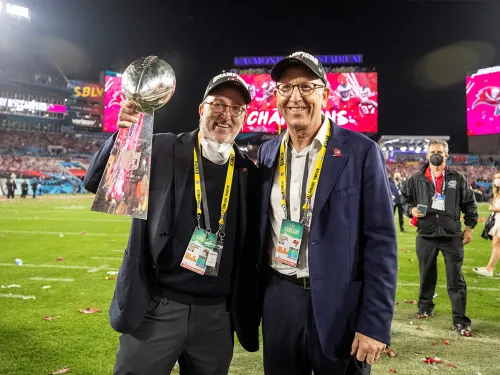 owner with the Vince Lombardi Trophy