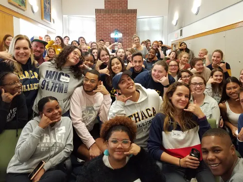 President Collado with students