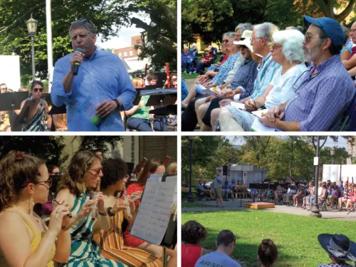 Friends of Ithaca College executive committee member Jerry Dietz ‘75 (top left) speaks before a performance of the IC Wind Ensemble during the Founder’s Day Concert in the Park in September 2019.