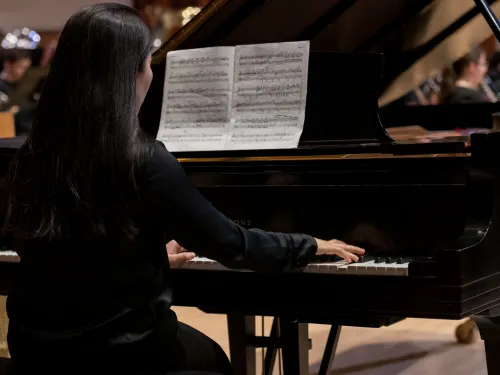 student playing piano