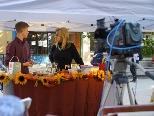 students in front of camera