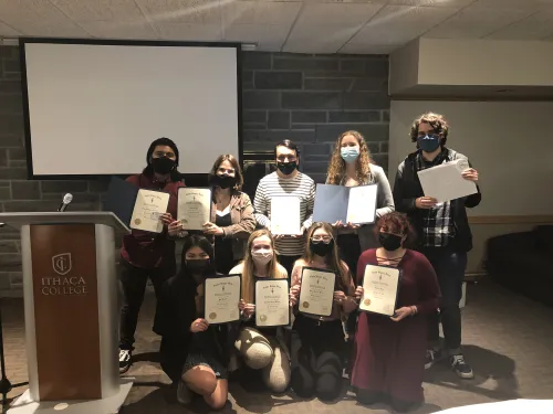 Students Holding Certificates