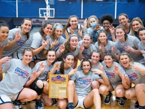 Women's basketball team celebrating