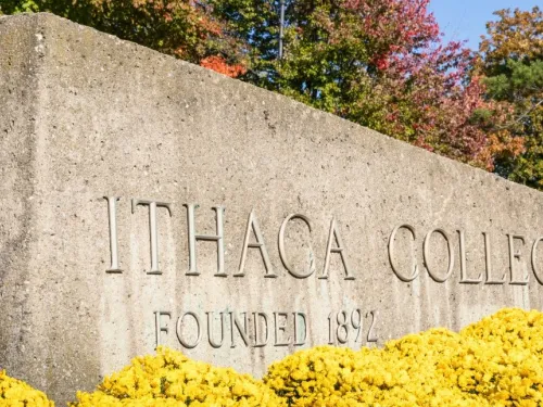 stone sign with letter on it