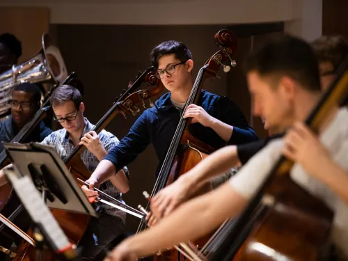 students playing stringed instruments 