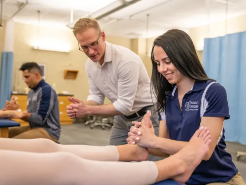 A student providing treatment to an ankle